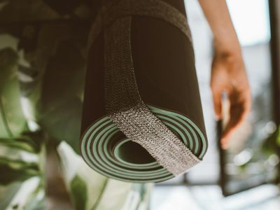 Close up of a yoga mat and cotton strap
