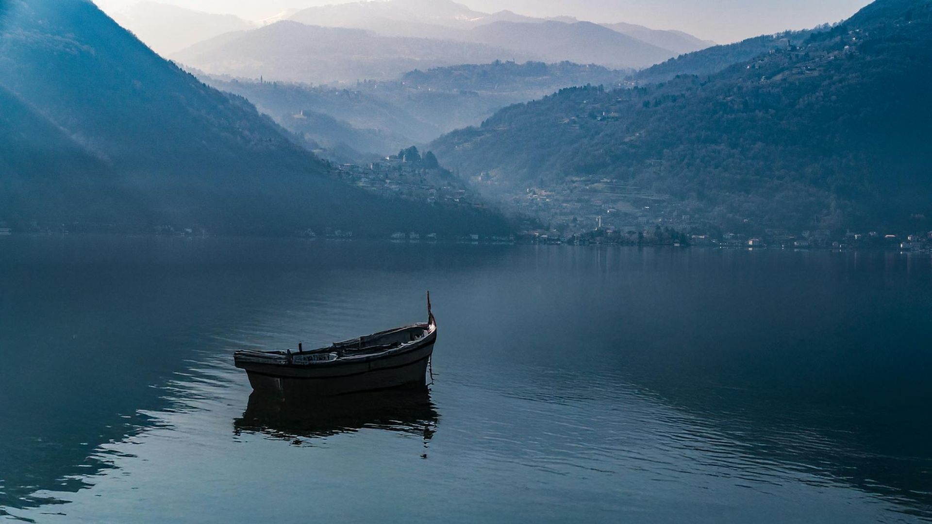 Serene natural landscape with a soft morning fog in mountains